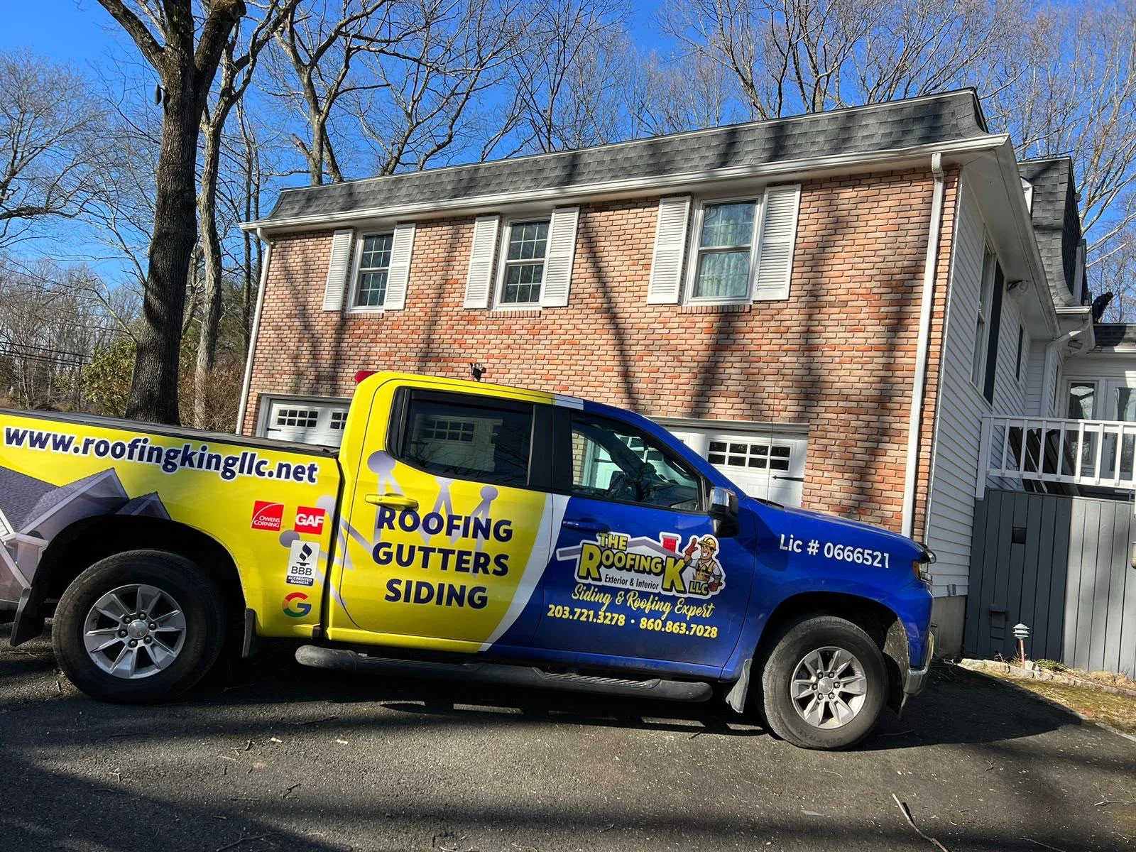 Roofing King LLC branded service truck